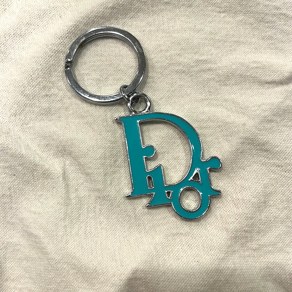Dior silver and blue resin keychain